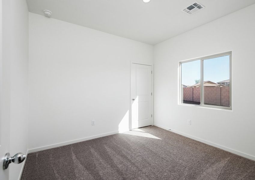 The guest bedrooms each come with natural lighting and closet space for guests to enjoy.