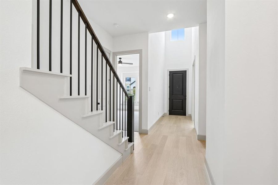 With high ceilings and a striking stair case, you'll love inviting guests into your new dream home! With high ceilings and a striking stair case, you'll love inviting guests into your new dream home!