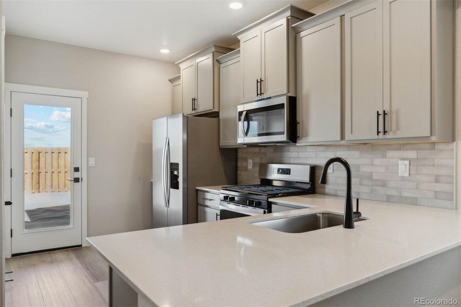 Furnished interior view inside a new home in Second Creek Farm, Commerce City (Image 7).