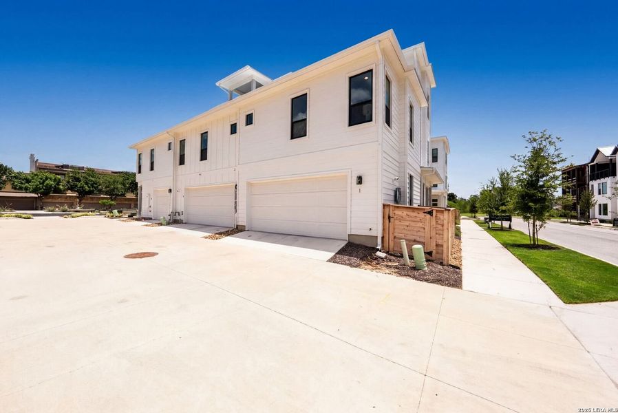 Front exterior of a new home in Victoria Commons, San Antonio, TX, highlighting curb appeal (Image 28).