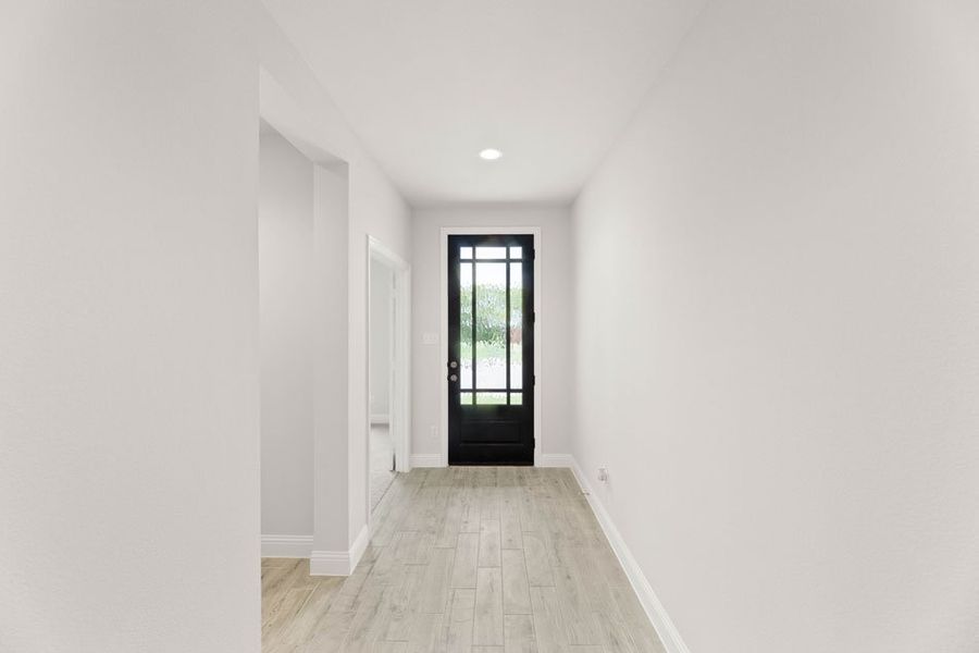 Front exterior of a new home in Timberbrook, Justin, TX, highlighting curb appeal (Image 6). Front exterior of a new home in Timberbrook, Justin, TX, highlighting curb appeal (Image 6).