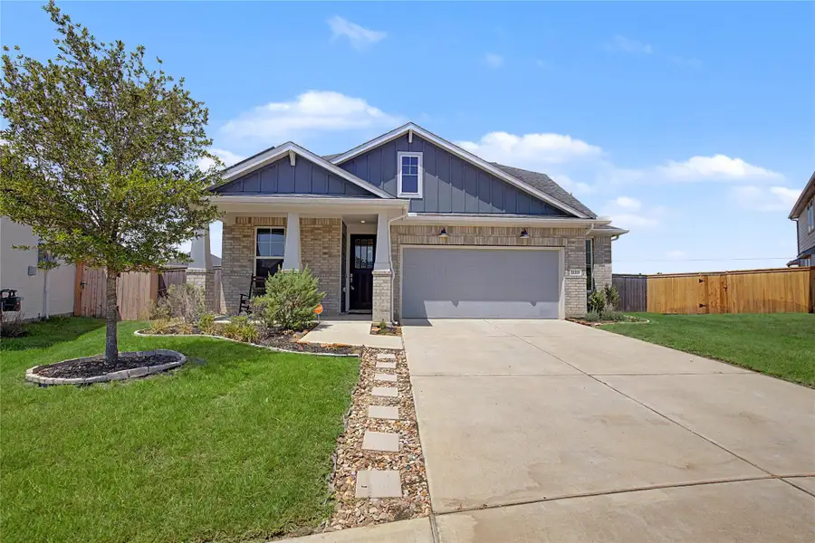 Front exterior of a new home in , Tomball, TX, highlighting curb appeal (Image 1). Front exterior of a new home in , Tomball, TX, highlighting curb appeal (Image 1).