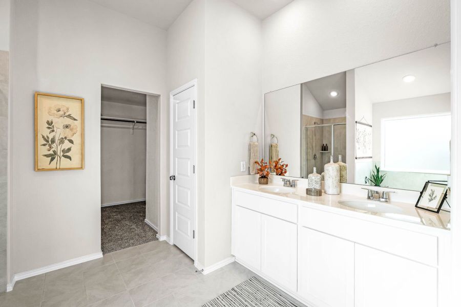 This is the primary bathroom of the Hawkins plan and is the model home in Carillon at 13305 Eppright Trace Blvd., Manor, TX. This is the primary bathroom of the Hawkins plan and is the model home in Carillon at 13305 Eppright Trace Blvd., Manor, TX.