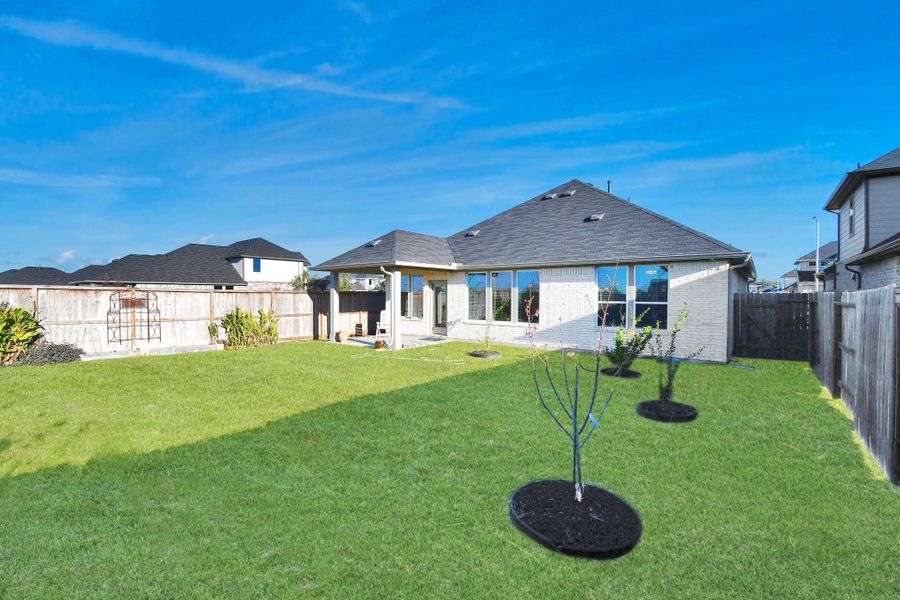 Exterior details and patio area of a home in The Timbers at Mason Woods, Cypress (Image 28).