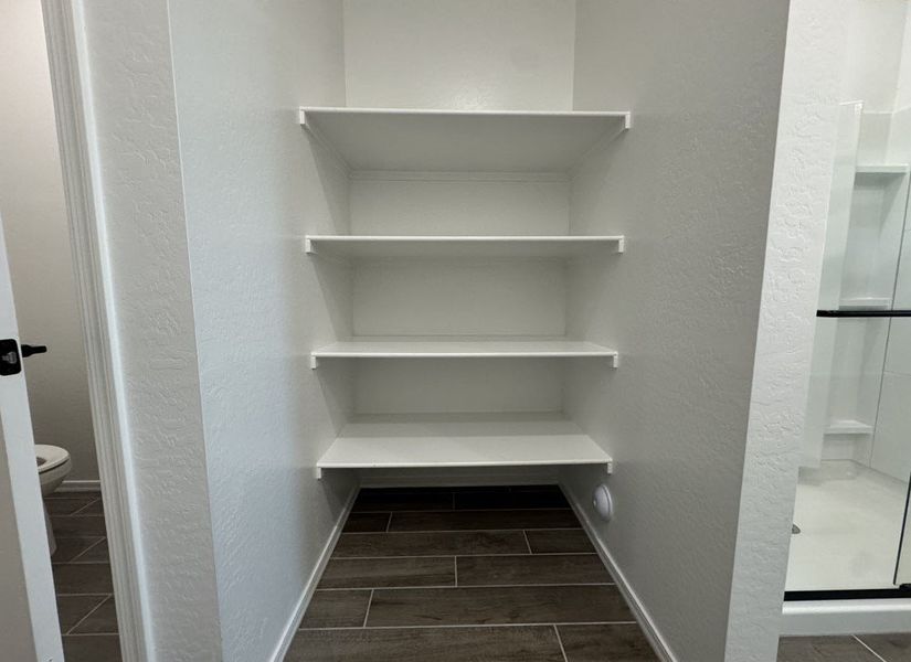 Linen closet in primary bathroom