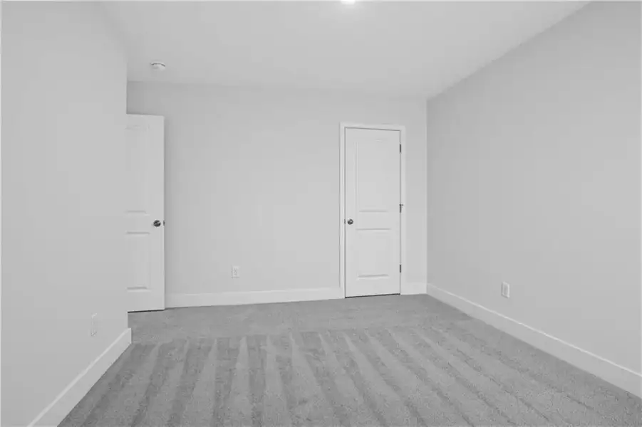 Spacious, unfurnished interior of a new home in Towns at Holly Springs, Holly Springs (Image 25).