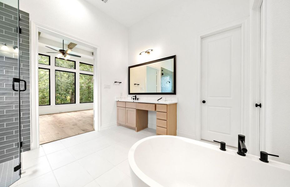 Furnished interior view inside a new home in Bridgeland 60′, Cypress (Image 10).