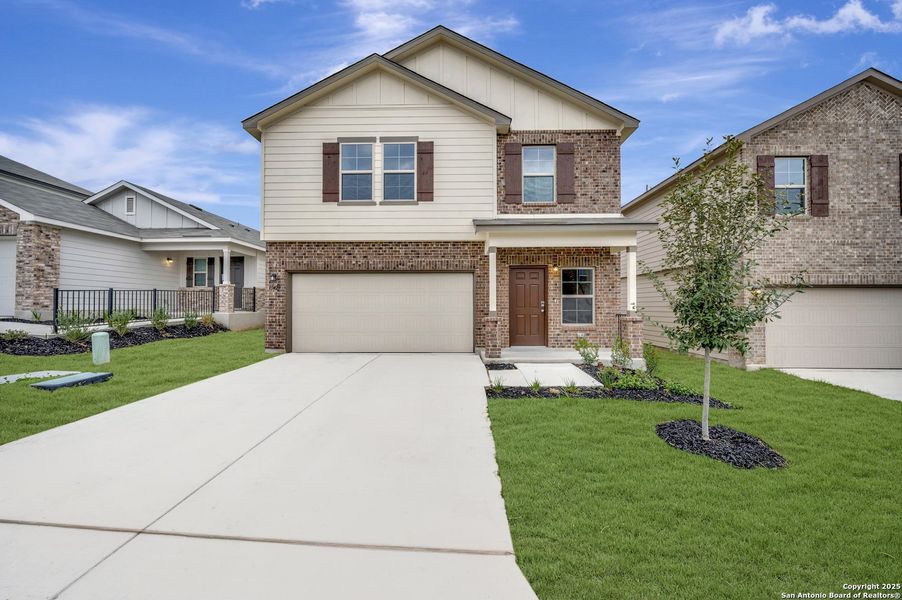 Front exterior of a new home in Paloma Park, Converse, TX, highlighting curb appeal (Image 23).