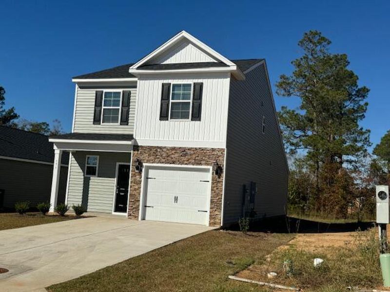 Front exterior of a new home in , Orangeburg, SC, highlighting curb appeal (Image 1). Front exterior of a new home in , Orangeburg, SC, highlighting curb appeal (Image 1).