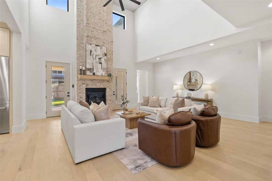 This view highlights how seamlessly your indoor living extends outward, with glass doors and open circulation leading toward the backyard. It’s the kind of layout that makes gatherings flow naturally while still giving you defined, comfortable spaces to unwind.