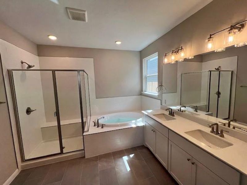 Deluxe Primary Bathroom w/ Walk-in Shower & Garden Tub