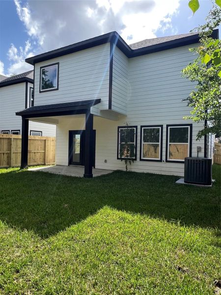 Spacious back yard for you furry friends to run around in