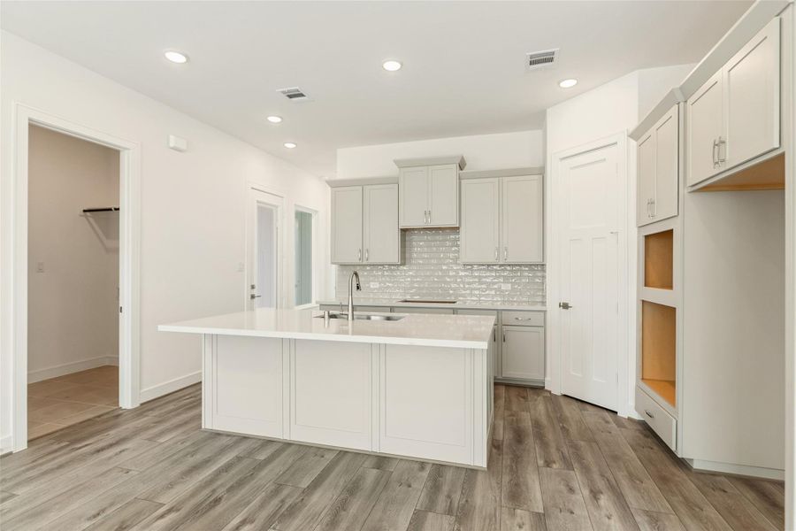 Furnished interior view inside a new home in Bridgeland Central, Cypress (Image 9).