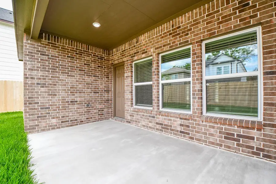 Exterior details and patio area of a home in , Houston (Image 4). Exterior details and patio area of a home in , Houston (Image 4).