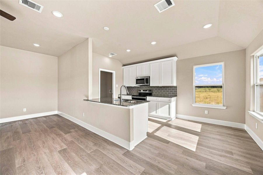 Furnished interior view inside a new home in Crockett Meadows, Conroe (Image 5).