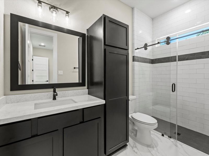 Bath #2 with walk in shower and ample cabinet space. Bath #2 with walk in shower and ample cabinet space.