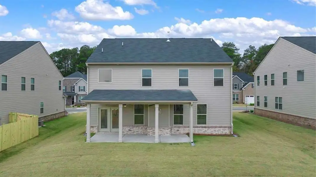 Exterior details and patio area of a home in Heritage Pointe, Senoia (Image 2).