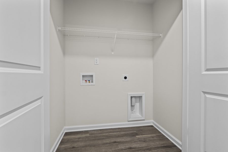 Representative furnished interior of a home built from the Cedar A by McGuinn Homes in Forts Ridge, Pelion (Image 13).