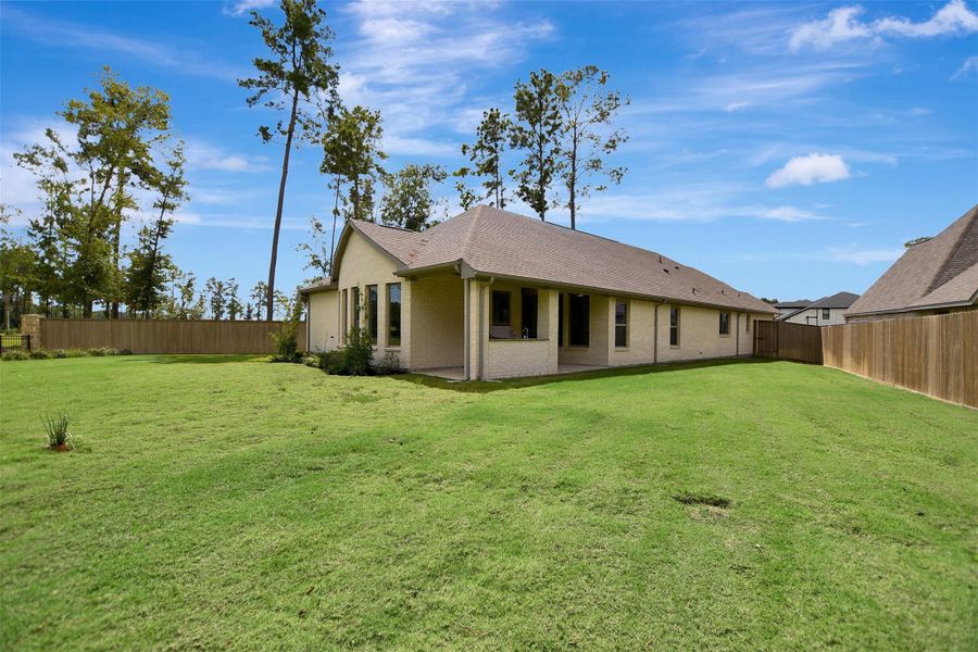 Exterior details and patio area of a home in The Highlands, Porter (Image 29).