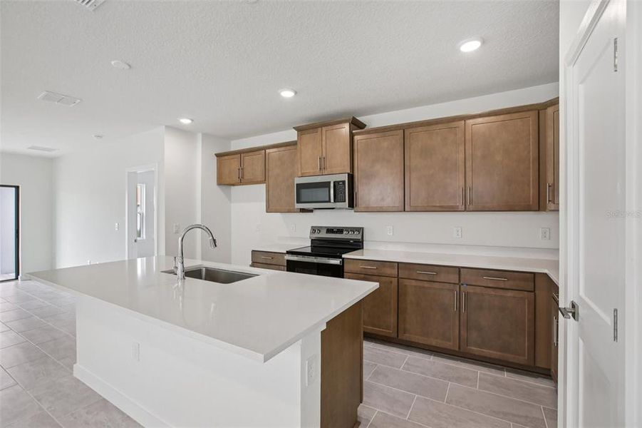 Furnished interior view inside a new home in Grasslands West, Lakeland (Image 8).