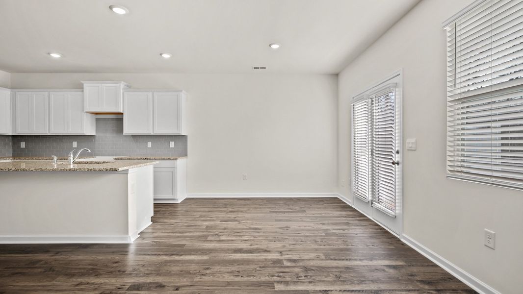 Representative unfurnished interior of a home built from the Salisbury by D.R. Horton in Inverness at Sugarloaf, Lawrenceville (Image 15).