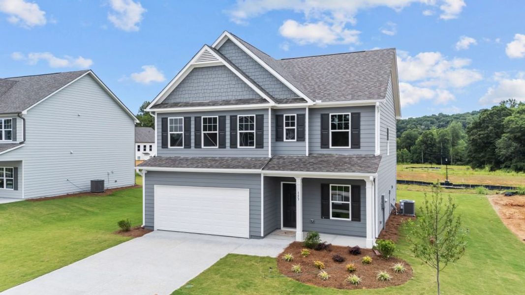 Front exterior of a new home in Hampton Ridge, Jefferson, GA, highlighting curb appeal (Image 4). Front exterior of a new home in Hampton Ridge, Jefferson, GA, highlighting curb appeal (Image 4).