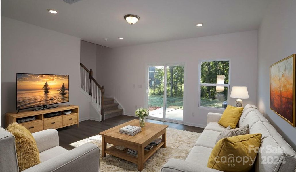 Family room shown with virtual staging