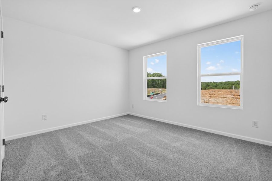 Spacious, unfurnished interior of a new home in Weatherfield, Buford (Image 21).