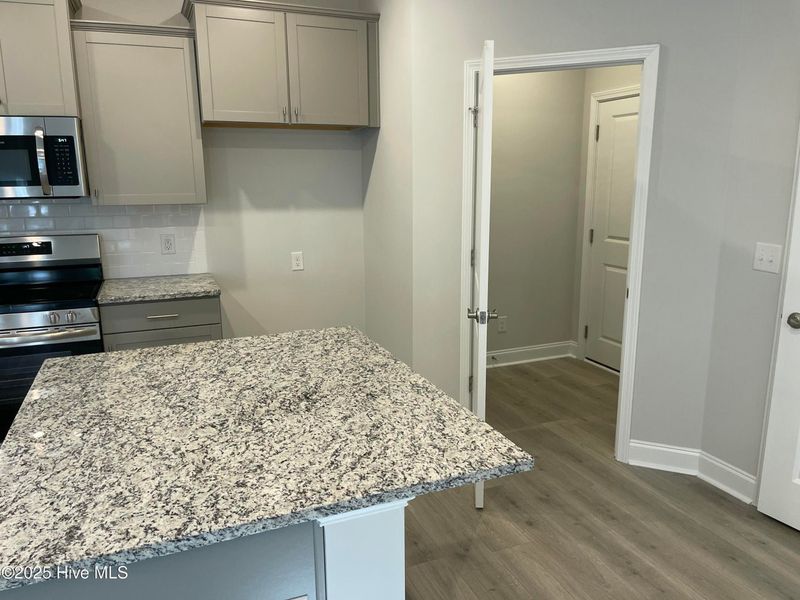 Furnished interior view inside a new home in Mill Creek Cove, Bolivia (Image 7).