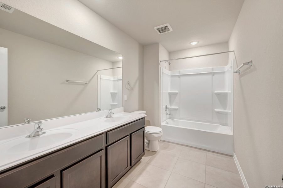 Furnished interior view inside a new home in Mesquite Ridge, San Antonio (Image 11).