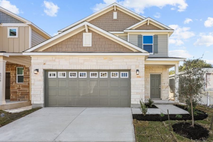 Front exterior of a new home in Senna, Leon Valley, TX, highlighting curb appeal (Image 1). Front exterior of a new home in Senna, Leon Valley, TX, highlighting curb appeal (Image 1).