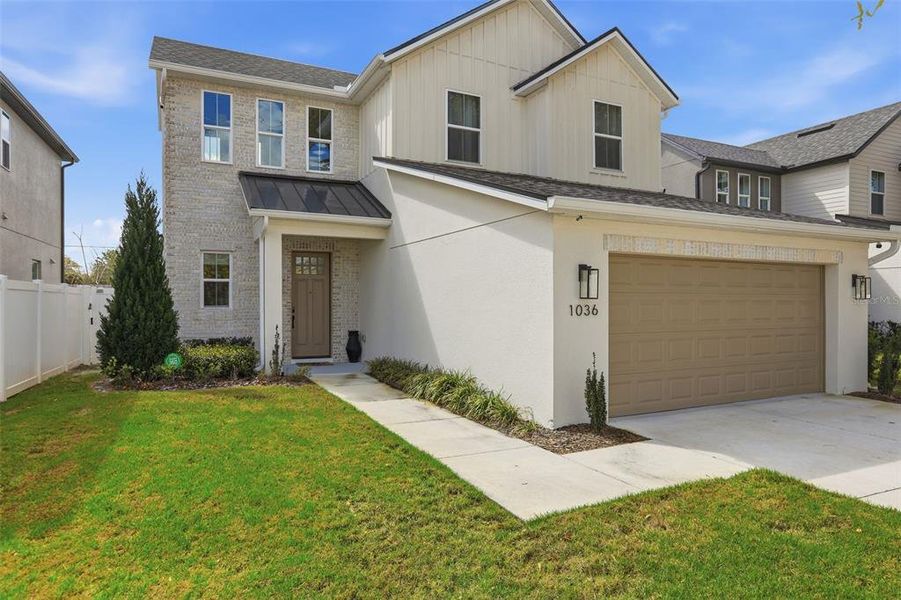 Front exterior of a new home in , Orlando, FL, highlighting curb appeal (Image 2). Front exterior of a new home in , Orlando, FL, highlighting curb appeal (Image 2).