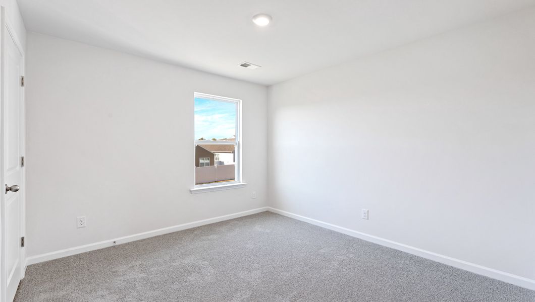 Spacious, unfurnished interior of a new home in Durbin Meadows Traditions, Fountain Inn (Image 25).