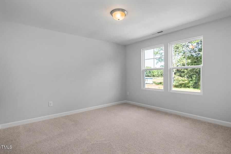 Spacious, unfurnished interior of a new home in Woodland Crossing, Zebulon (Image 26).