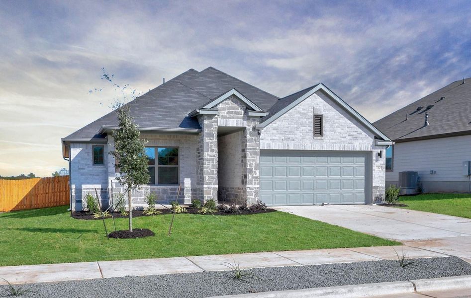 Front exterior of a new home in Prairie Winds, Hutto, TX, highlighting curb appeal (Image 2). Front exterior of a new home in Prairie Winds, Hutto, TX, highlighting curb appeal (Image 2).