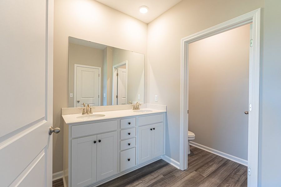Representative furnished interior of a home built from the Dillon II by Great Southern Homes in Shady Grove, Conway (Image 31).