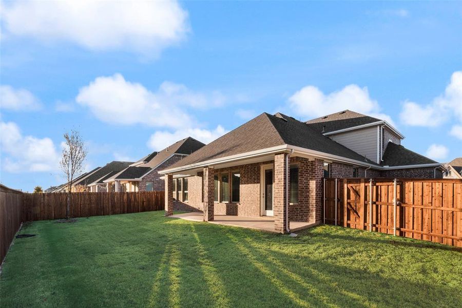 Exterior details and patio area of a home in Sutton Fields, Celina (Image 3).