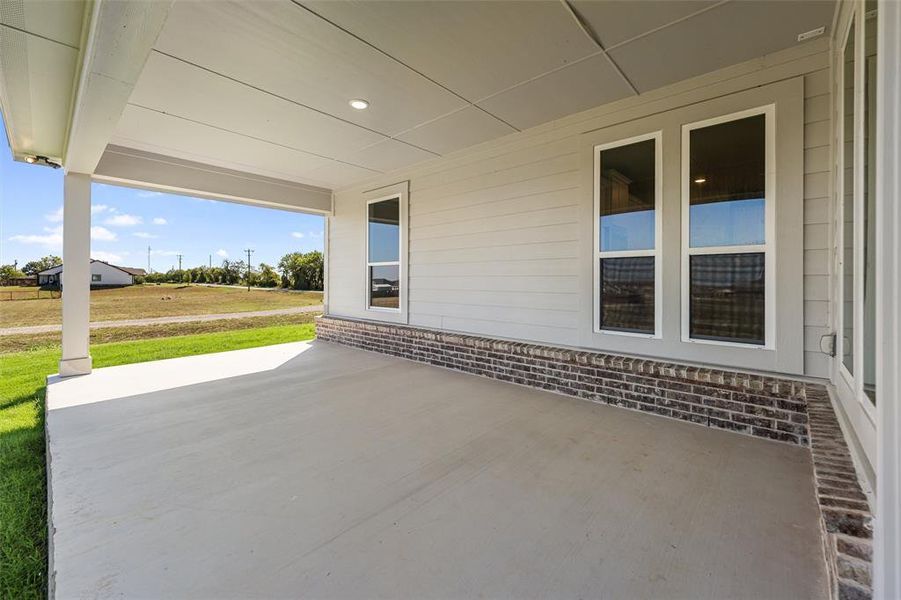 Exterior details and patio area of a home in Fairview Meadows, Rhome (Image 19). Exterior details and patio area of a home in Fairview Meadows, Rhome (Image 19).