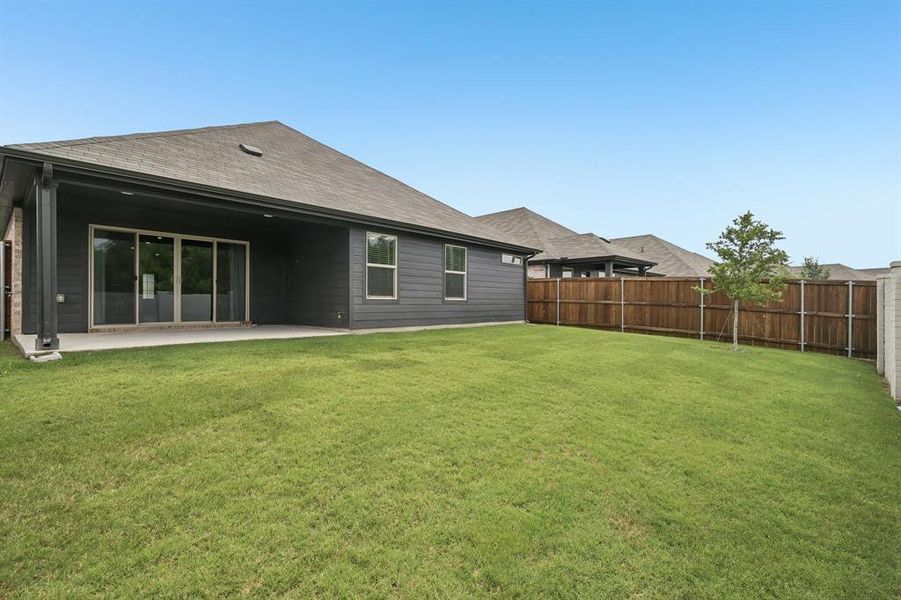 Exterior details and patio area of a home in Lakehaven - Signature Series, Farmersville (Image 24). Exterior details and patio area of a home in Lakehaven - Signature Series, Farmersville (Image 24).