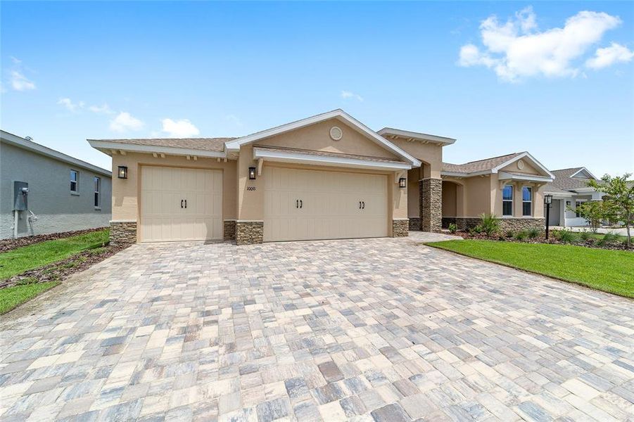 Front exterior of a new home in On Top of the World Communities, Ocala, FL, highlighting curb appeal (Image 22).