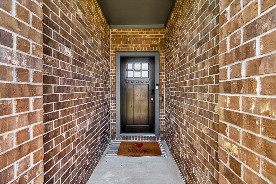 Exterior details and patio area of a home in Westland Ranch 50' Homesites, League City (Image 3).