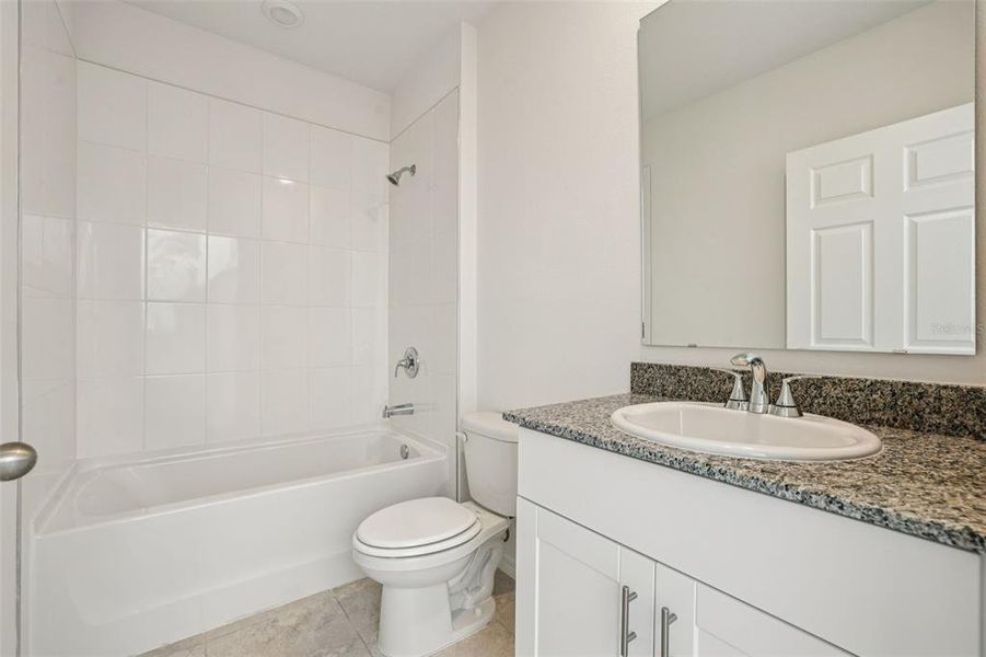 Furnished interior view inside a new home in Lake Deer Estates - Signature Series, Poinciana (Image 11).