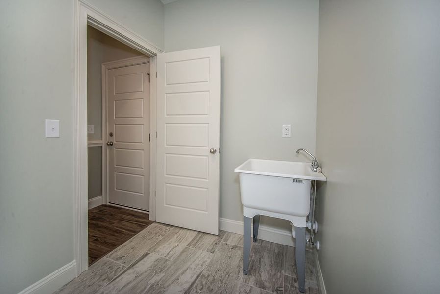 Representative unfurnished interior of a home built from the Mediterranean by Enchanted Homes in Lonesome Dove, San Antonio (Image 44).