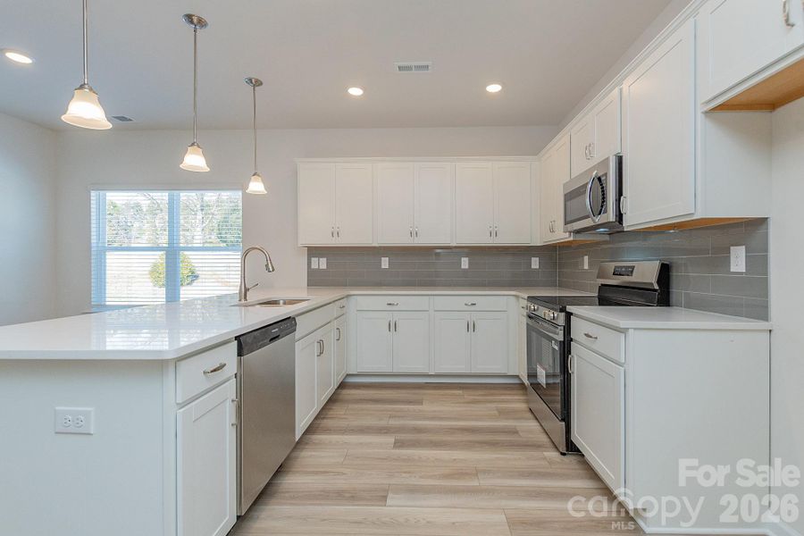 Furnished interior view inside a new home in Country Club Village, Salisbury (Image 10).