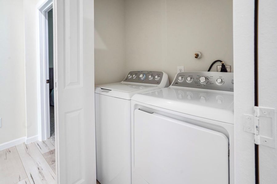 Utility room on the third floor where the other two bedrooms are located.