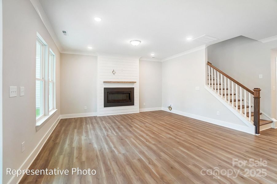 Home will have a traditional, corner fireplace with slate surround