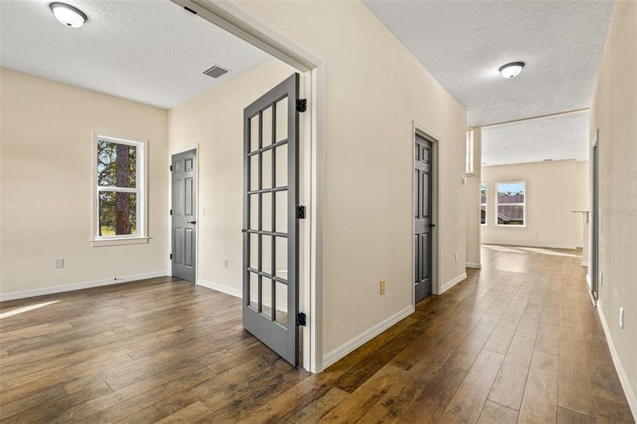 French doors and full walk in closet in 5th bedroom / flex space.