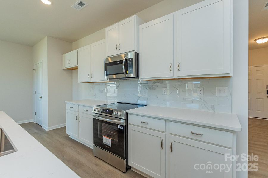 Furnished interior view inside a new home in Country Club Village, Salisbury (Image 9). Furnished interior view inside a new home in Country Club Village, Salisbury (Image 9).