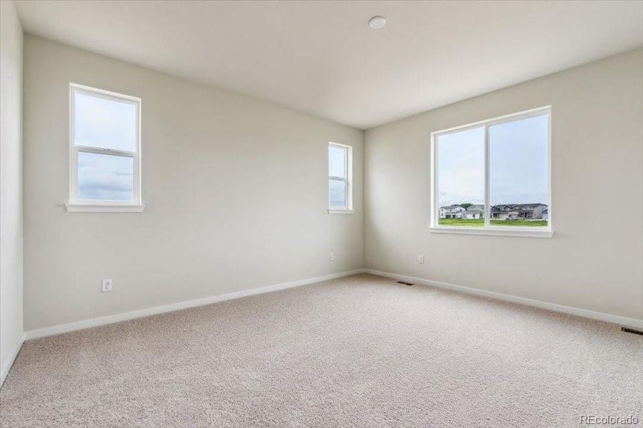 Spacious, unfurnished interior of a new home in Red Barn Meadows, Mead (Image 18).