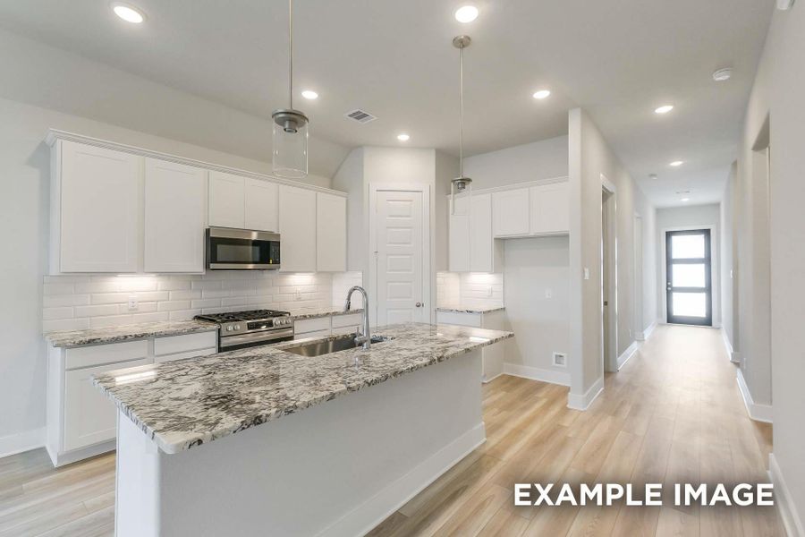 Furnished interior view inside a new home in Sunterra, Katy (Image 3).